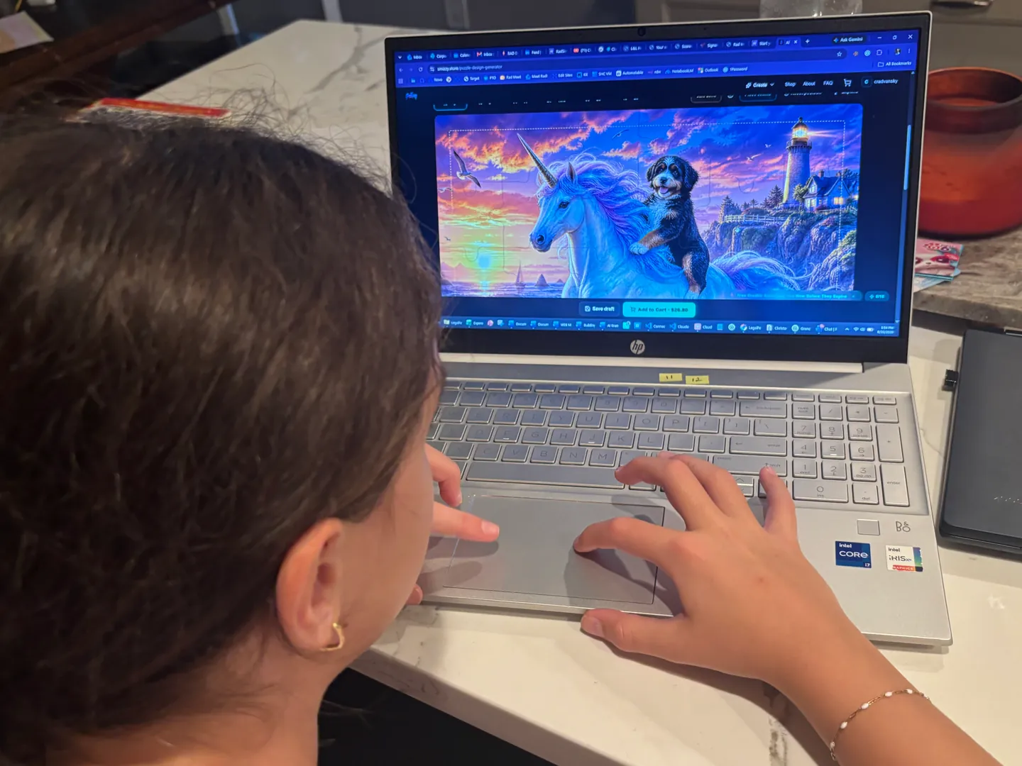 A girl reviewing a unicorn-and-puppy design in the Smizzy puzzle generator on a laptop